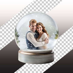 Couple embracing inside a snowy globe