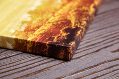 Close-up of textured canvas print on wooden surface