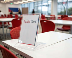Table tent on desk in busy conference room